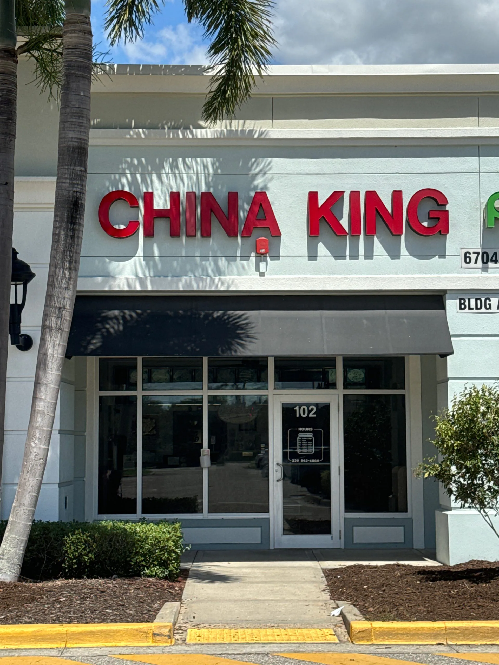 Exterior of China King Restaurant storefront with red signage at China King Restaurant, a Chinese Restaurant in North Fort Myers